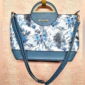 Blue multicolor and purse in great condition.